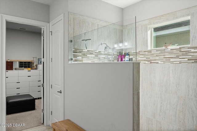 bathroom featuring walk in shower