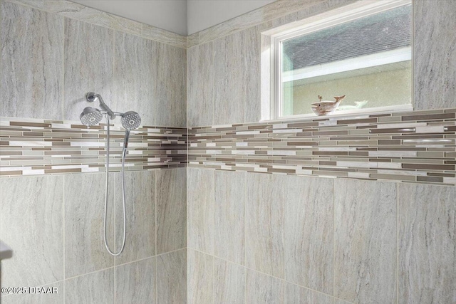 details featuring a tile shower