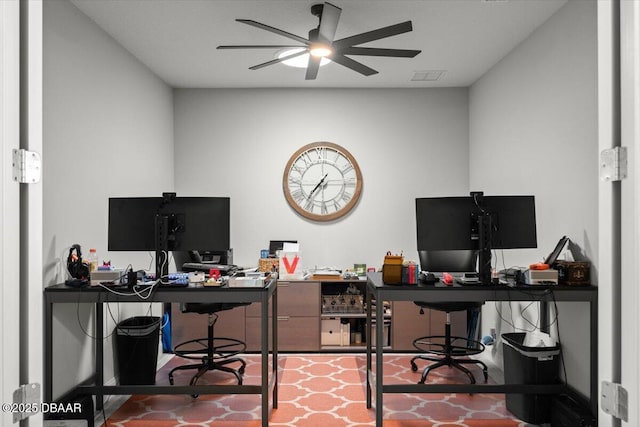 office space featuring ceiling fan