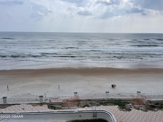 property view of water featuring a beach view