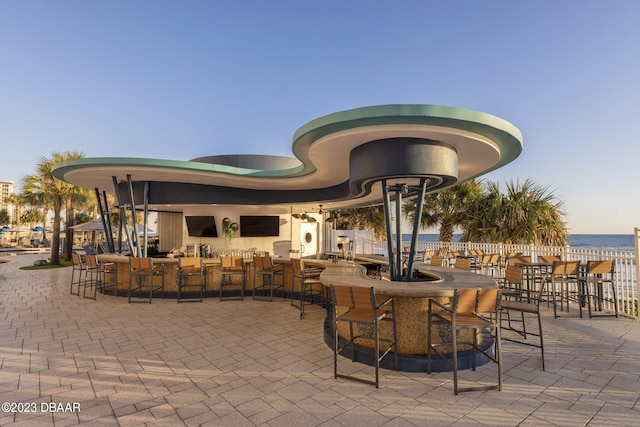 view of patio / terrace featuring an outdoor bar