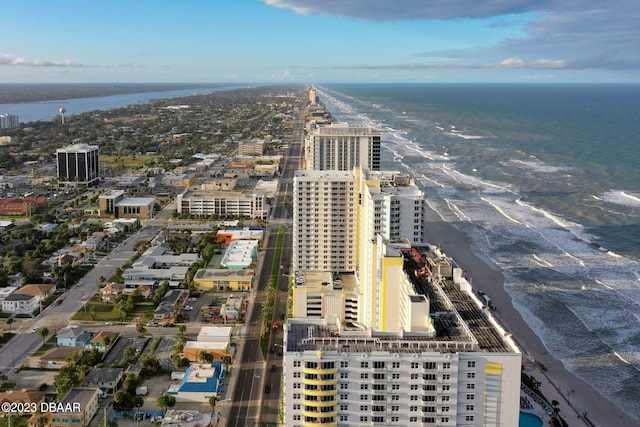 aerial view with a beach view and a water view