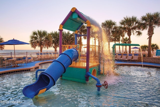 view of playground at dusk