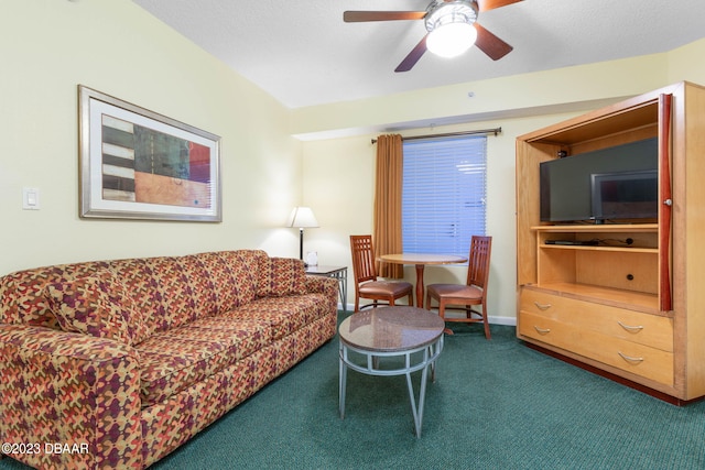 living room with ceiling fan, a textured ceiling, and carpet flooring