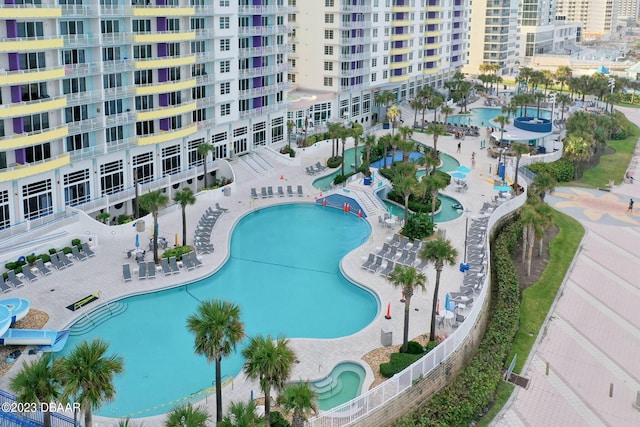 view of swimming pool featuring a patio