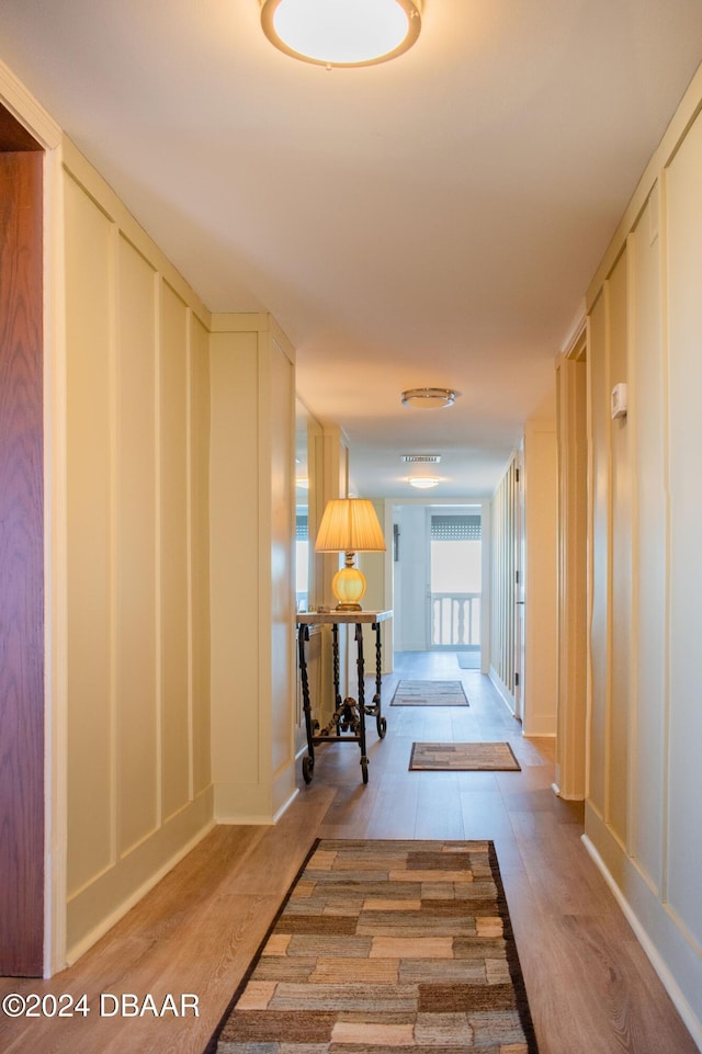 hallway featuring light hardwood / wood-style flooring