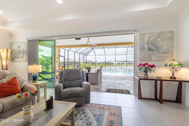 318 Good Life Way, Daytona Beach, FL 32124 - tiled living room with a sunroom, ornamental molding, a tray ceiling, and recessed lighting