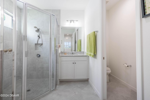 318 Good Life Way, Daytona Beach, FL 32124 - bathroom featuring a stall shower, toilet, vanity, and baseboards