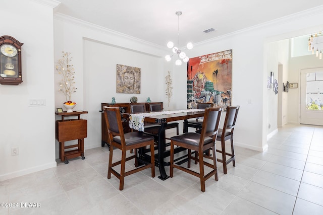 dining area with light tile patterned flooring, a chandelier, and crown molding