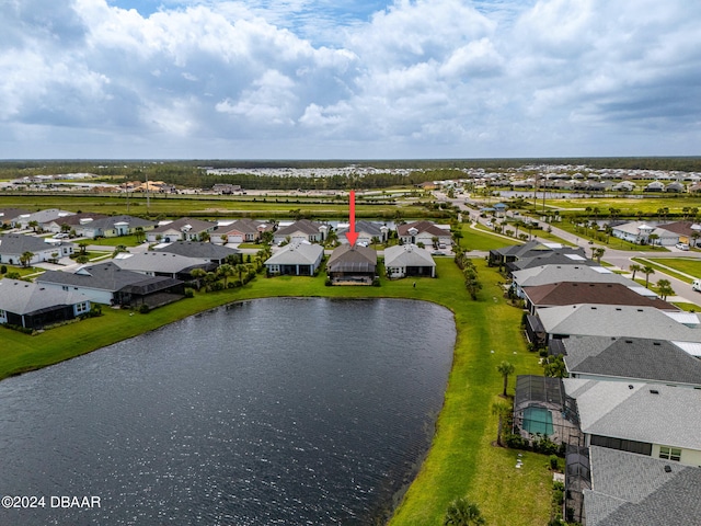 drone / aerial view with a water view