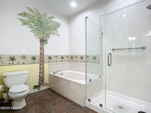 4 Oceans W Blvd Unit 108B, Daytona Beach Shores, FL 32118 - bathroom featuring a stall shower, toilet, a bath, and stone finish floors
