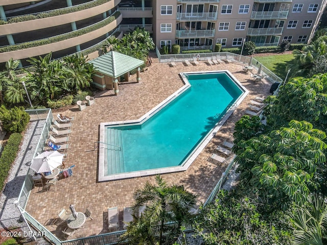 4 Oceans W Blvd Unit 108B, Daytona Beach Shores, FL 32118 - community pool featuring a patio and fence