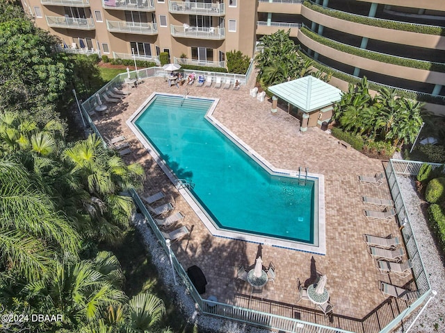 4 Oceans W Blvd Unit 108B, Daytona Beach Shores, FL 32118 - community pool featuring a patio