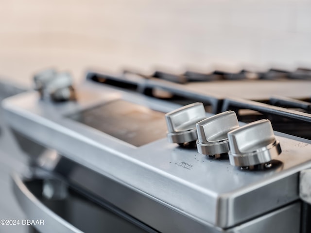 interior details featuring stainless steel range oven