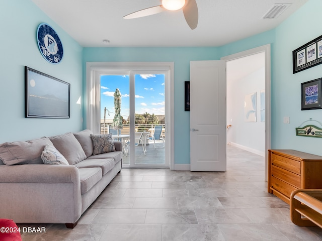 living room featuring ceiling fan