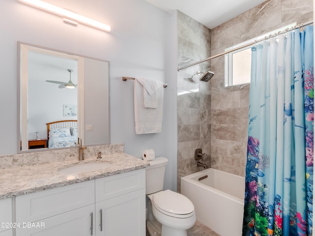 full bathroom with vanity, ceiling fan, toilet, and shower / tub combo