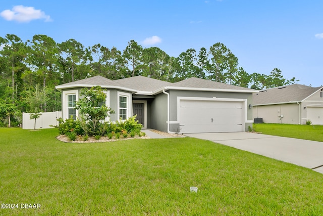 view of front facade featuring a garage and a front yard