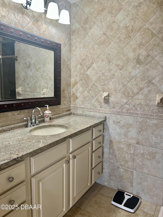 bathroom with vanity and tile patterned floors