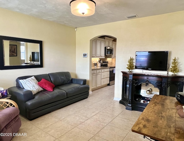 living room featuring light tile patterned floors