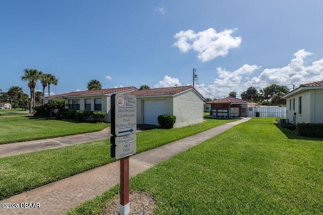 view of front of house with a front lawn