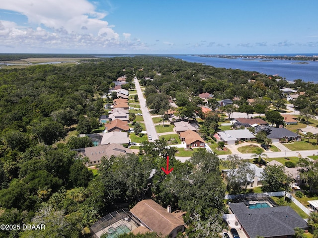 drone / aerial view featuring a residential view and a water view