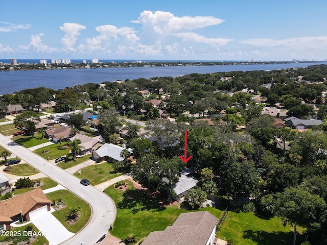 aerial view with a water view and a residential view