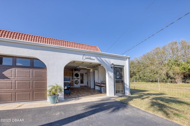 garage featuring fence