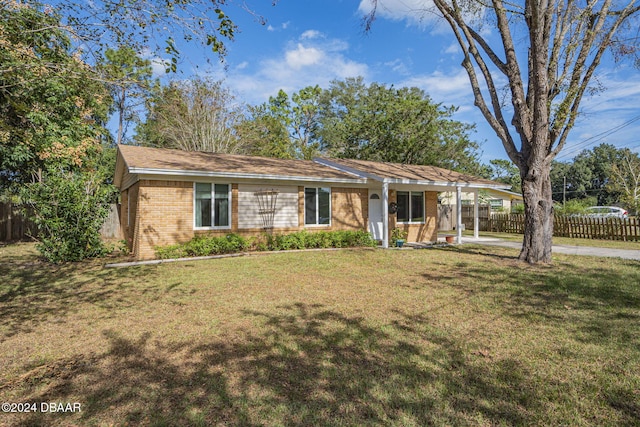 single story home featuring a front yard