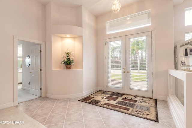 tiled entrance foyer with french doors