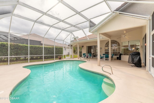 view of pool with a lanai, an outdoor living space, ceiling fan, a patio area, and a grill