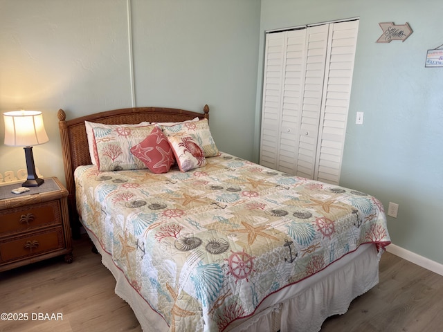 2615 S Atlantic Ave Unit 1D, Daytona Beach, FL 32118 - bedroom featuring light wood finished floors and a closet