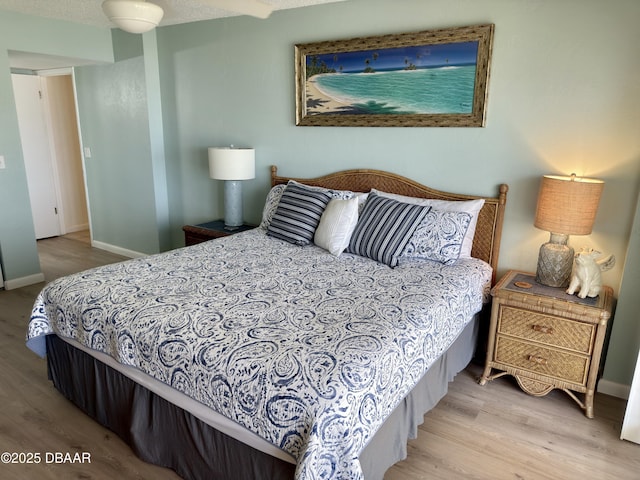 2615 S Atlantic Ave Unit 1D, Daytona Beach, FL 32118 - bedroom featuring wood finished floors and baseboards