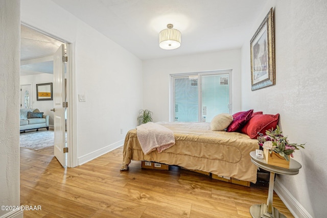 bedroom featuring hardwood / wood-style flooring