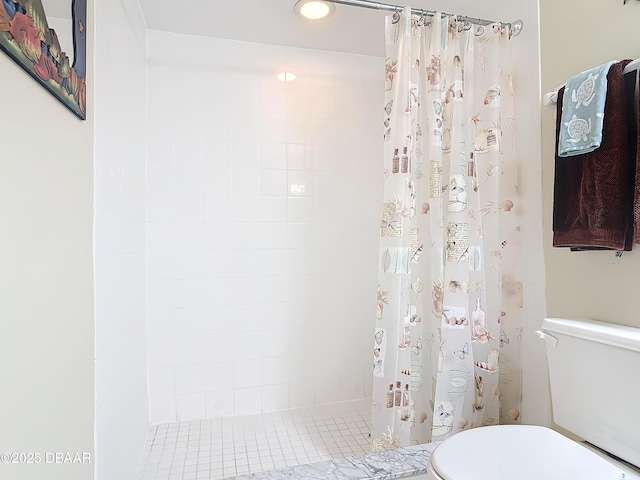 3333 S Atlantic Ave Unit 505, Daytona Beach, FL 32118 - full bathroom with toilet, tiled shower, and recessed lighting