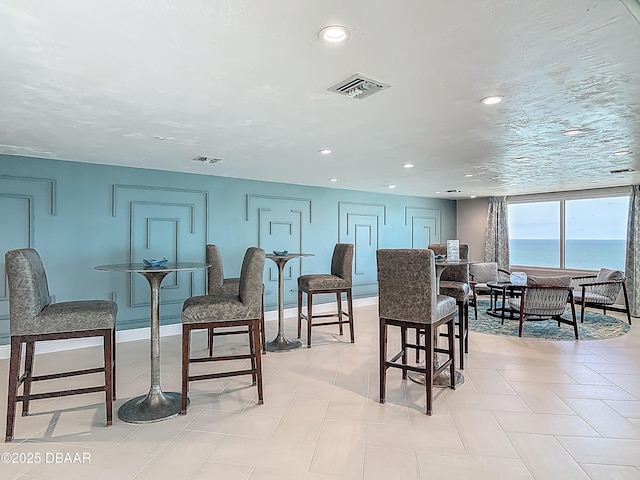 3333 S Atlantic Ave Unit 505, Daytona Beach, FL 32118 - dining room featuring recessed lighting and baseboards