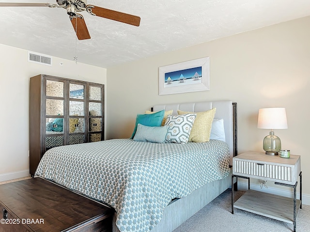 3333 S Atlantic Ave Unit 505, Daytona Beach, FL 32118 - bedroom with baseboards, a ceiling fan, and carpet