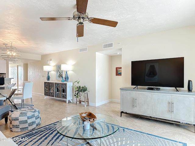 3333 S Atlantic Ave Unit 505, Daytona Beach, FL 32118 - living room featuring a ceiling fan and baseboards