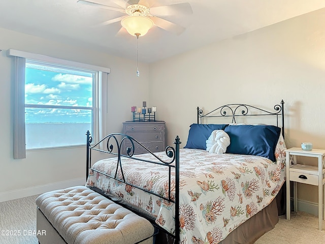 3333 S Atlantic Ave Unit 505, Daytona Beach, FL 32118 - carpeted bedroom featuring baseboards and a ceiling fan