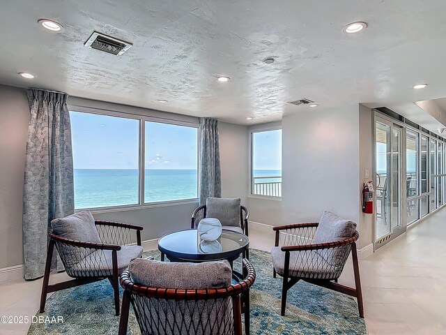 3333 S Atlantic Ave Unit 505, Daytona Beach, FL 32118 - sitting room with baseboards and recessed lighting