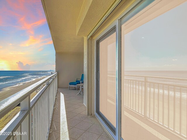 3333 S Atlantic Ave Unit 505, Daytona Beach, FL 32118 - balcony at dusk with view of water and beach