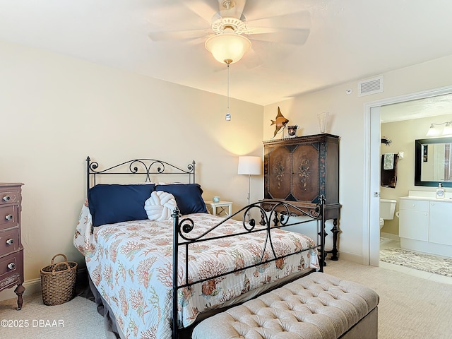 3333 S Atlantic Ave Unit 505, Daytona Beach, FL 32118 - bedroom featuring carpet flooring, ensuite bathroom, and a ceiling fan