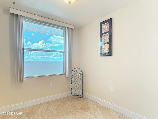 3333 S Atlantic Ave Unit 505, Daytona Beach, FL 32118 - unfurnished room featuring baseboards