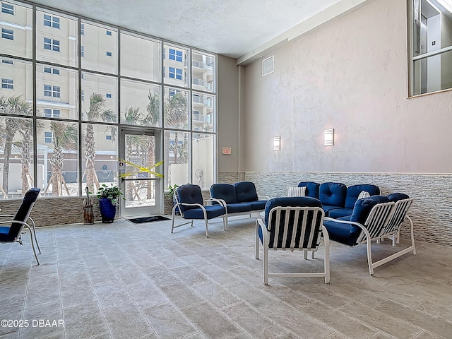 3333 S Atlantic Ave Unit 505, Daytona Beach, FL 32118 - building lobby featuring a wall of windows