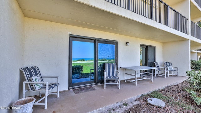 view of patio / terrace with a balcony