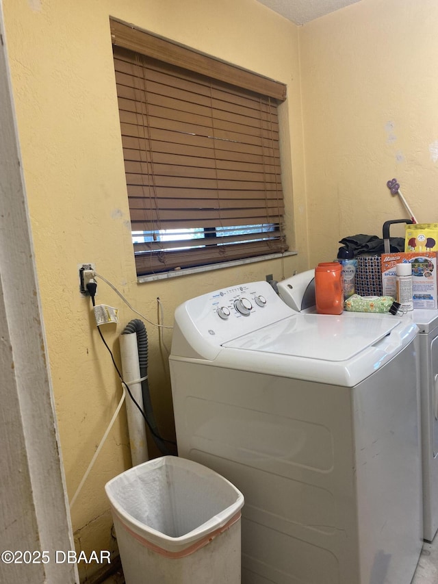6 Waterberry Cir, Ormond Beach, FL 32174 - laundry room featuring independent washer and dryer and a textured wall