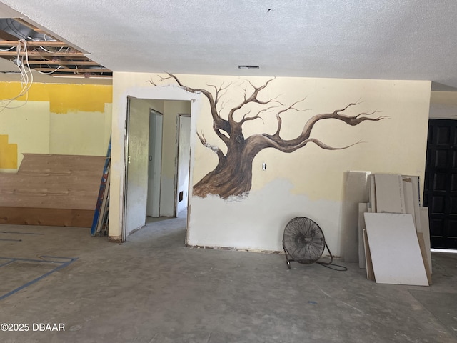 6 Waterberry Cir, Ormond Beach, FL 32174 - spare room featuring concrete floors and a textured ceiling
