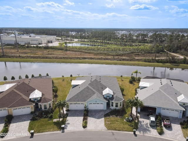 drone / aerial view with a water view