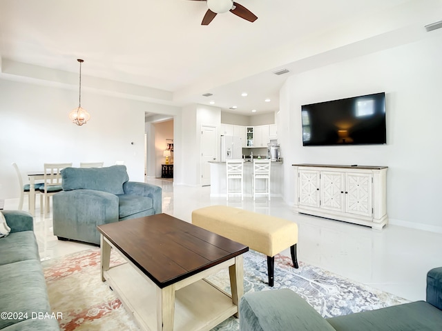 living room featuring ceiling fan