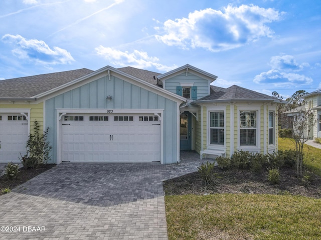 view of front of property with a garage