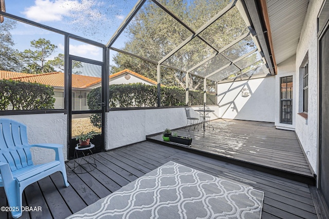 wooden terrace with glass enclosure